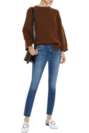 Click to view more detailed imagery on our partner's website J Brand Icon Distressed Mid-rise Skinny Jeans In Mid Denim
