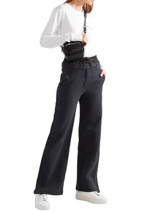 Click to view more detailed imagery on our partner's website Tibi Woman Shell-Paneled Cotton-Fleece Track Pants Midnight Blue
