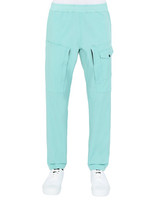  STONE ISLAND 312X4 STONE ISLAND MARINA<br>TWO-WAY STRETCH RECYCLED NYLON TWILL Trousers Man Aqua