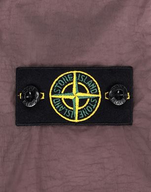 stone island jacket badge on front