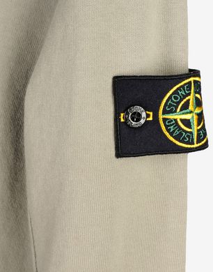stone island t shirt with badge on sleeve