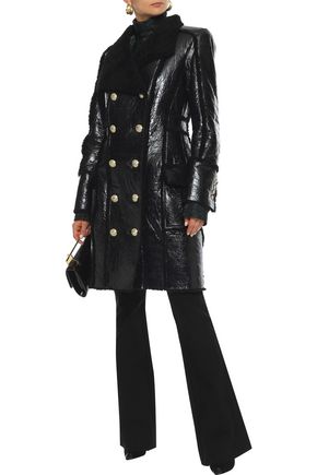 Click to view more detailed imagery on our partner's website Balmain Double-breasted Shearling And Glossed Cracked-leather Coat In Black