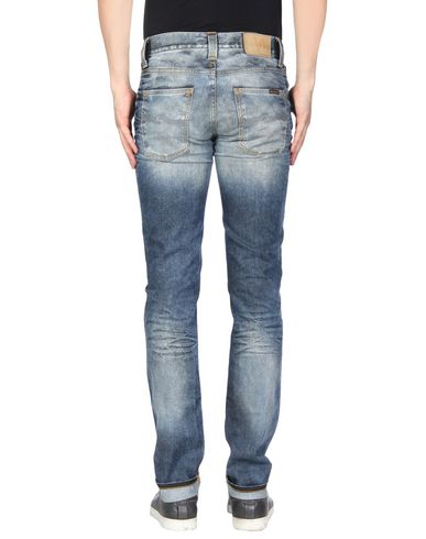 фото Джинсовые брюки nudie jeans co