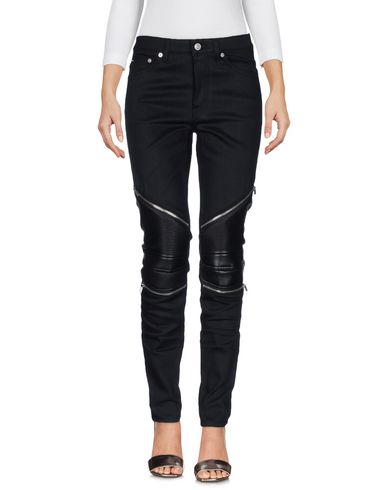 Джинсовые брюки Yves Saint Laurent 42635373IH