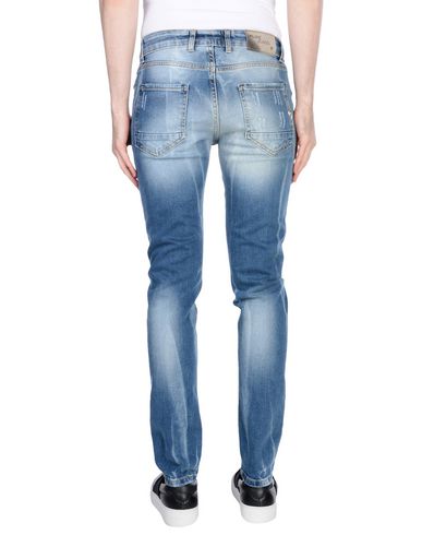 фото Джинсовые брюки Klixs jeans