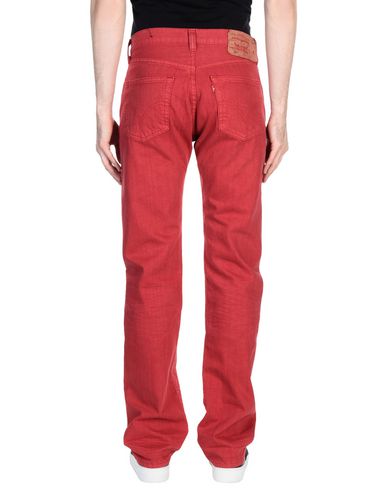 фото Джинсовые брюки Levi's red tab