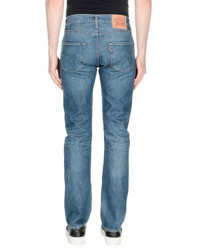 фото Джинсовые брюки Levi's red tab