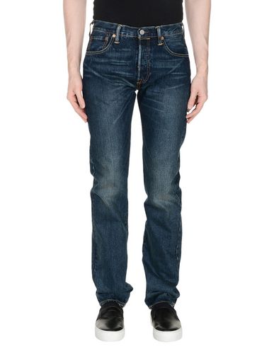 фото Джинсовые брюки Levi's red tab