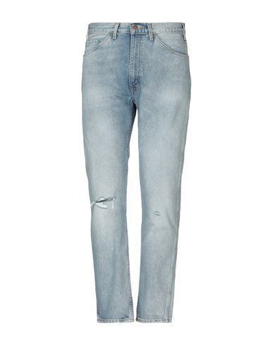 фото Джинсовые брюки Levi's red tab