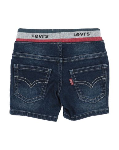 фото Джинсовые брюки Levi's red tab
