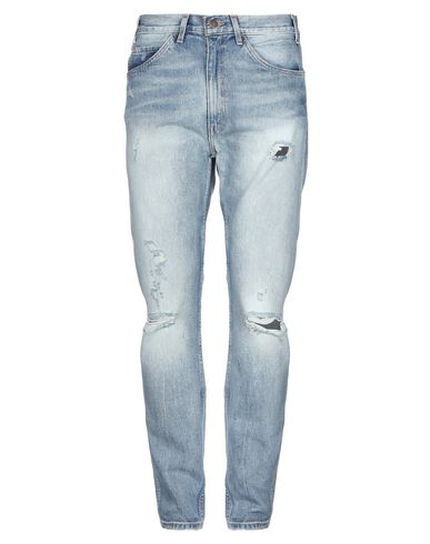 фото Джинсовые брюки Levi's red tab