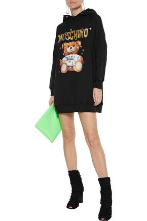 Click to view more detailed imagery on our partner's website Moschino Glittered Printed French Cotton-terry Hooded Mini Dress In Black