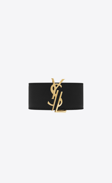 SAINT LAURENT Bracelets Woman de force bracelet in gold metal and black leather a_V4
