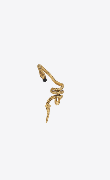 Snake ear jewelry in gold metal with a black glass bead.