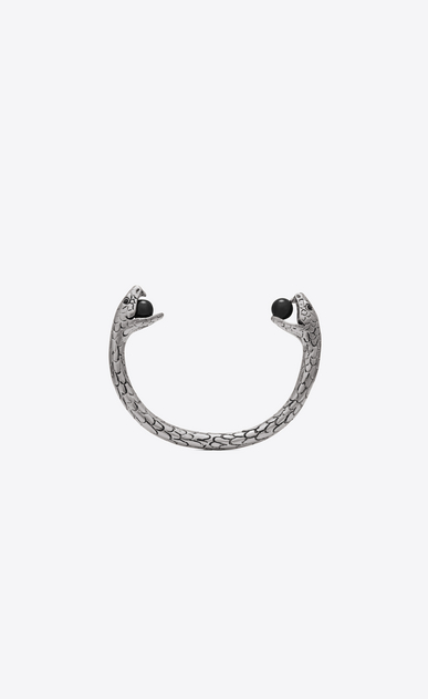 Snake bracelet in silver metal with black glass beads.