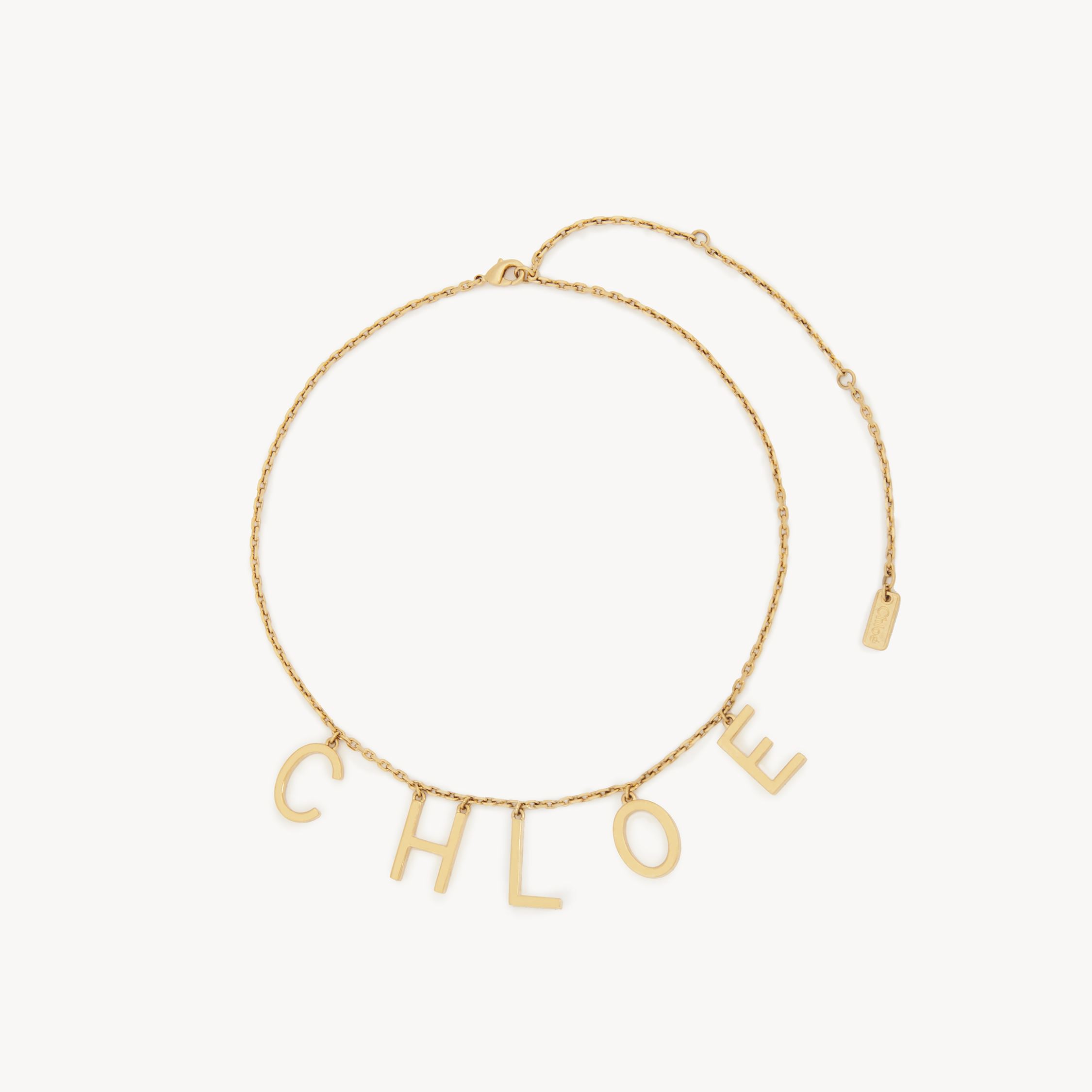 Chloé Metallic Belt With Adjustable Hook Closure And Logo Lettering Charm In Brass Woman In Gold