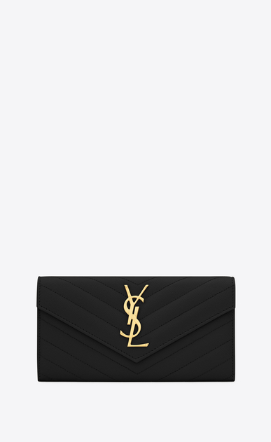 Monogram large flap wallet in grain de poudre embossed leather